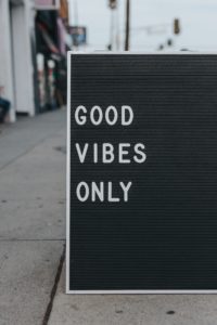 A sign saying, "Good vibes Only".